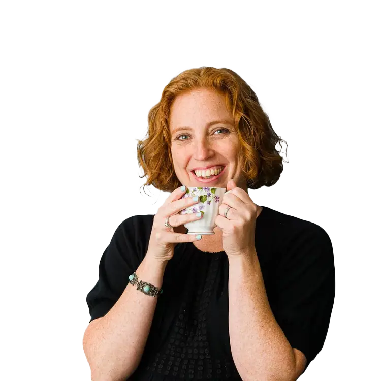 headshot of Stefani Pollack, wearing a black shirt and holding a teacup to her mouth